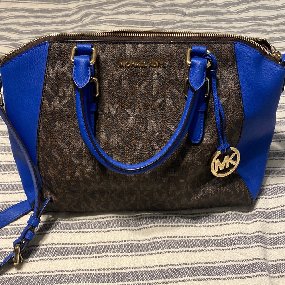 Lightly used Michael Kors purse in signature print; brown with cobalt blue